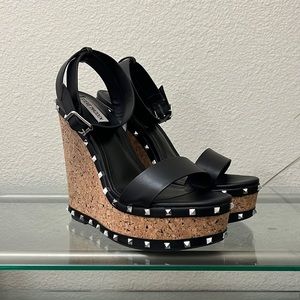 Behati platform studded wedges.